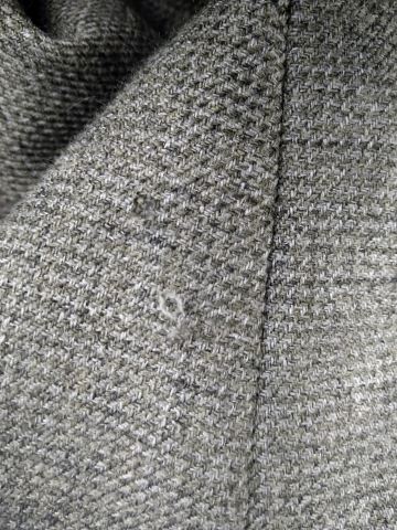 31 ニットコートの糸引き直し